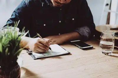 Man taking notes