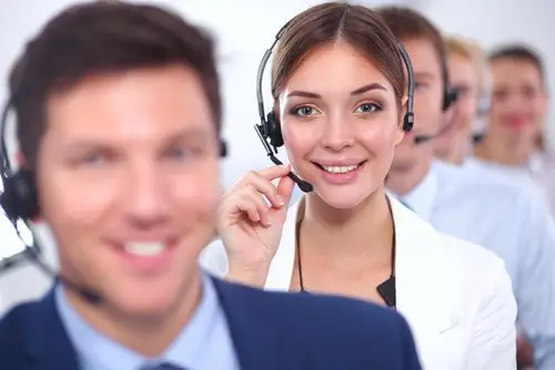 receptionist smiling with headset on